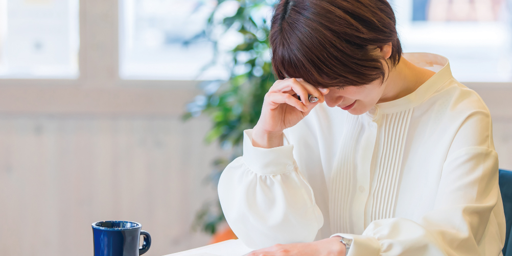 調子が悪い女性の画像